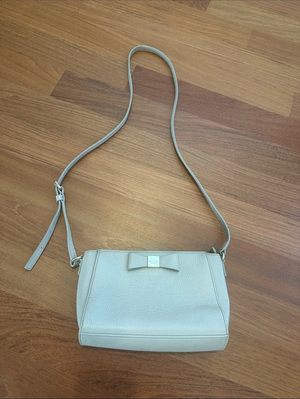 kate spade Pebble Leather Crossbody in Light Gray with Bow Accent